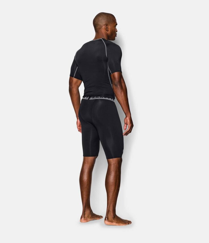 UA HG ARMOUR LONG COMP SHORT Šortky